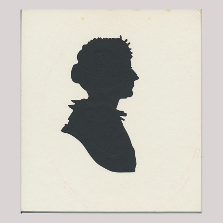 
        Front of silhouette, with woman looking right.
